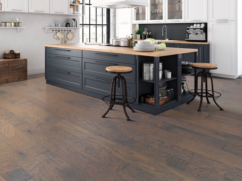 Kitchen with black cabinets and dark hardwood flooring from 180 Degree Floors in the Nashville, TN area